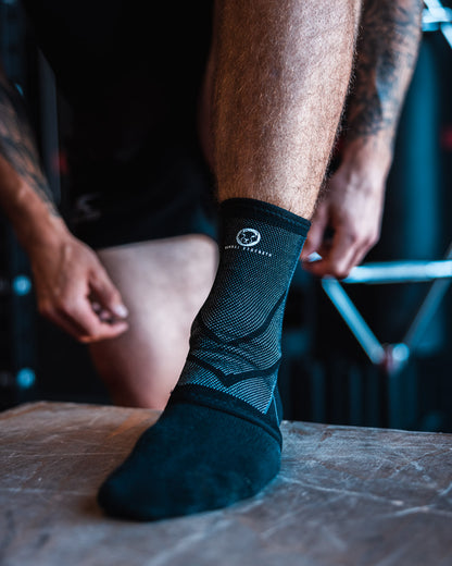 Ankle compression sleeves