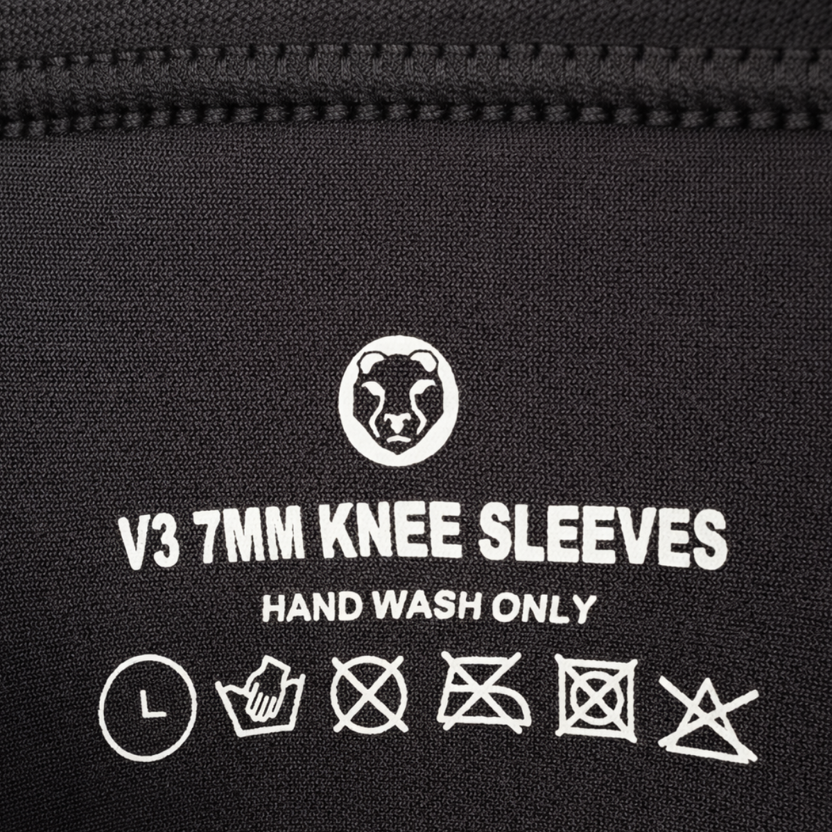 Care label and washing instructions printed on Mammal Strength V3 7mm knee sleeves
